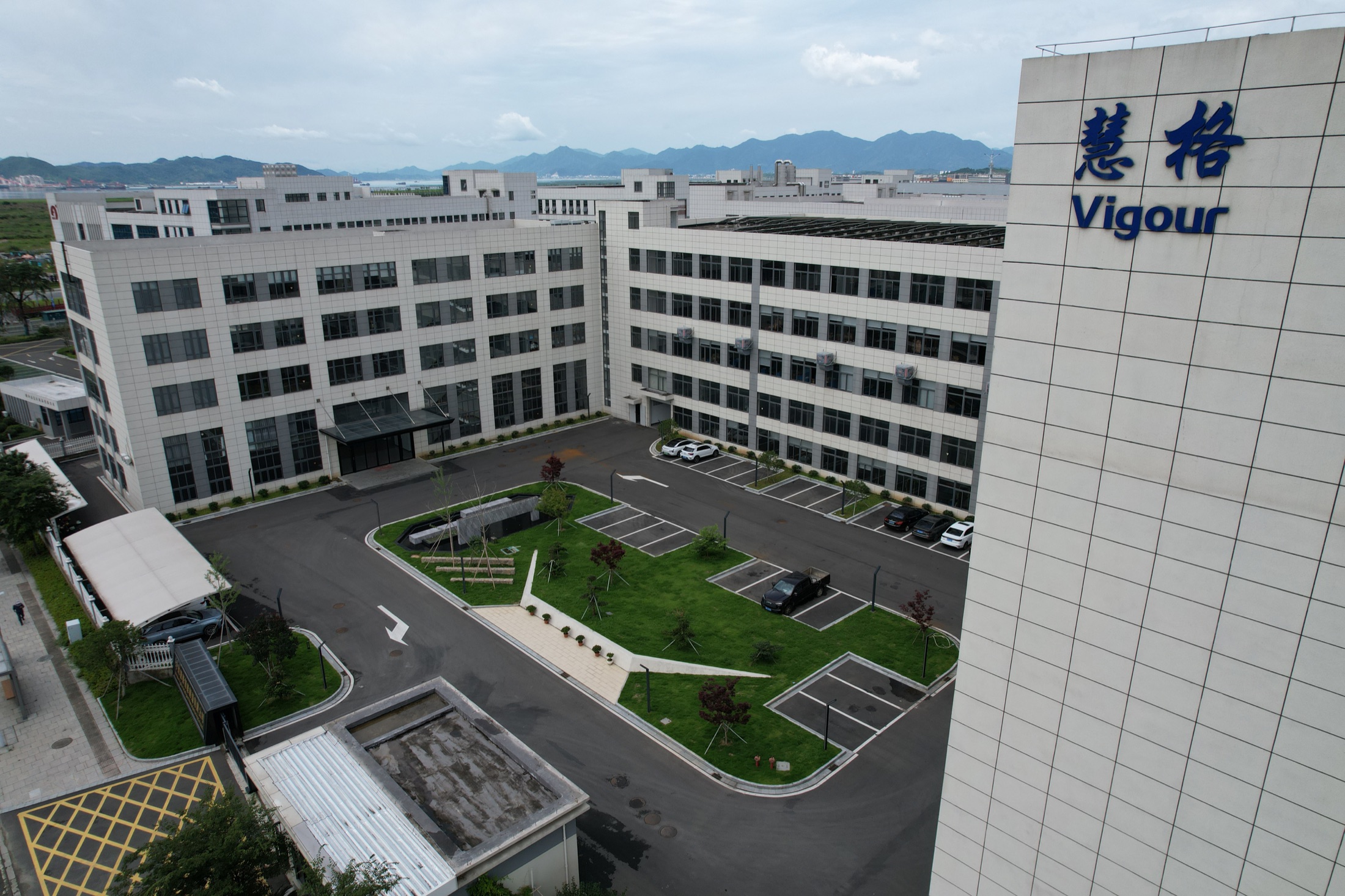 Vigour factory exterior with company sign